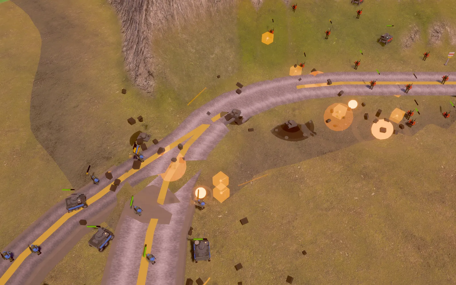 A road-junction firefight without HUD: a blue armoured column lower left trading fire with a red infantry line upper right, explosions and debris in the air.