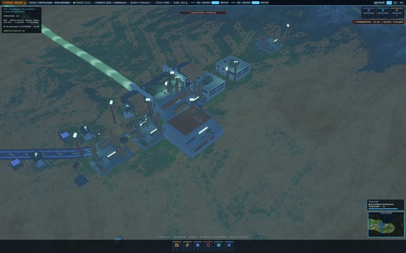 The base at night: floodlights, lit windows and the supply line glowing green.